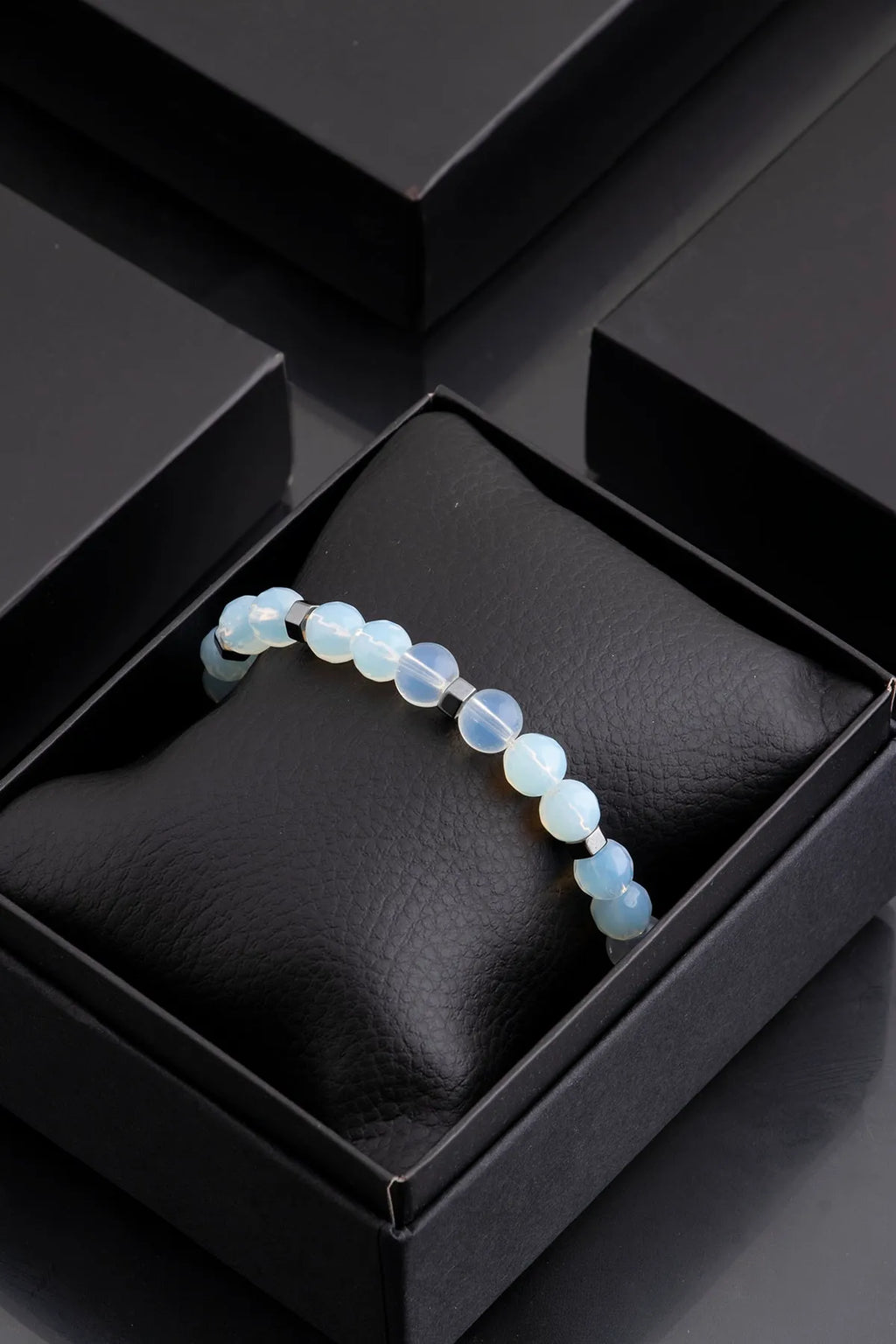 Hematite Original Natural Stone Unisex Bracelet - Ice Blue